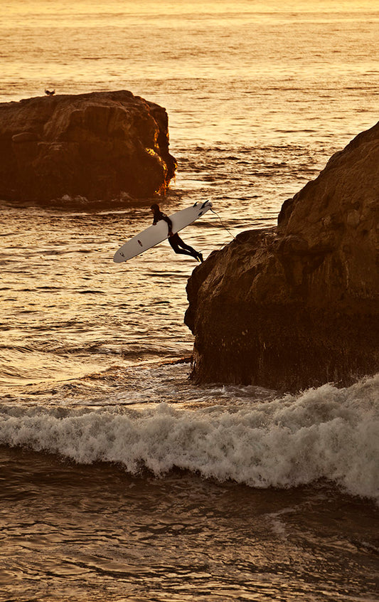 California Surfer Jumps From Cliff Photos